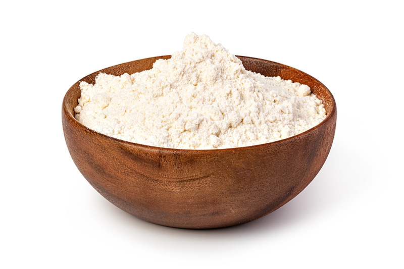 bowl of flour isolated on white background